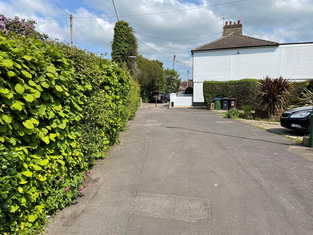 Lot: 8 - FREEHOLD LOCK-UP GARAGE INVESTMENT - View of road access to garage